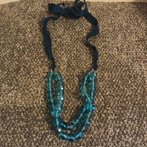 Double bead strand blue tie up necklace